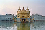 Amritsar - the Golden Temple - the Hari Mandir at the center of the the Pool of Nectar 